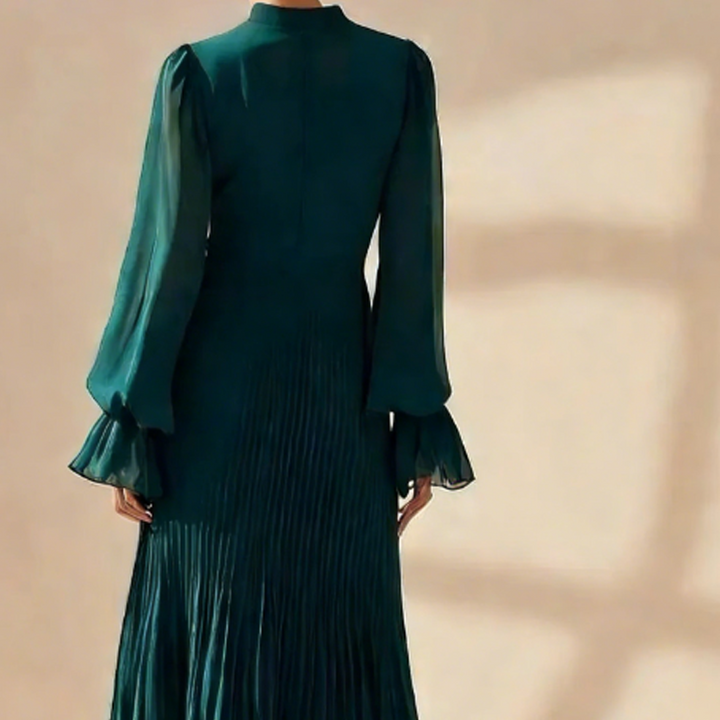 Vestido midi plisado elegante con volantes